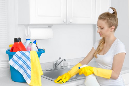 Carpet cleaner preparing a room for service in Enfield